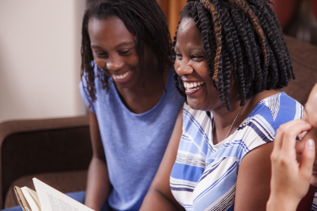 Smiling African American Mother and Daughter