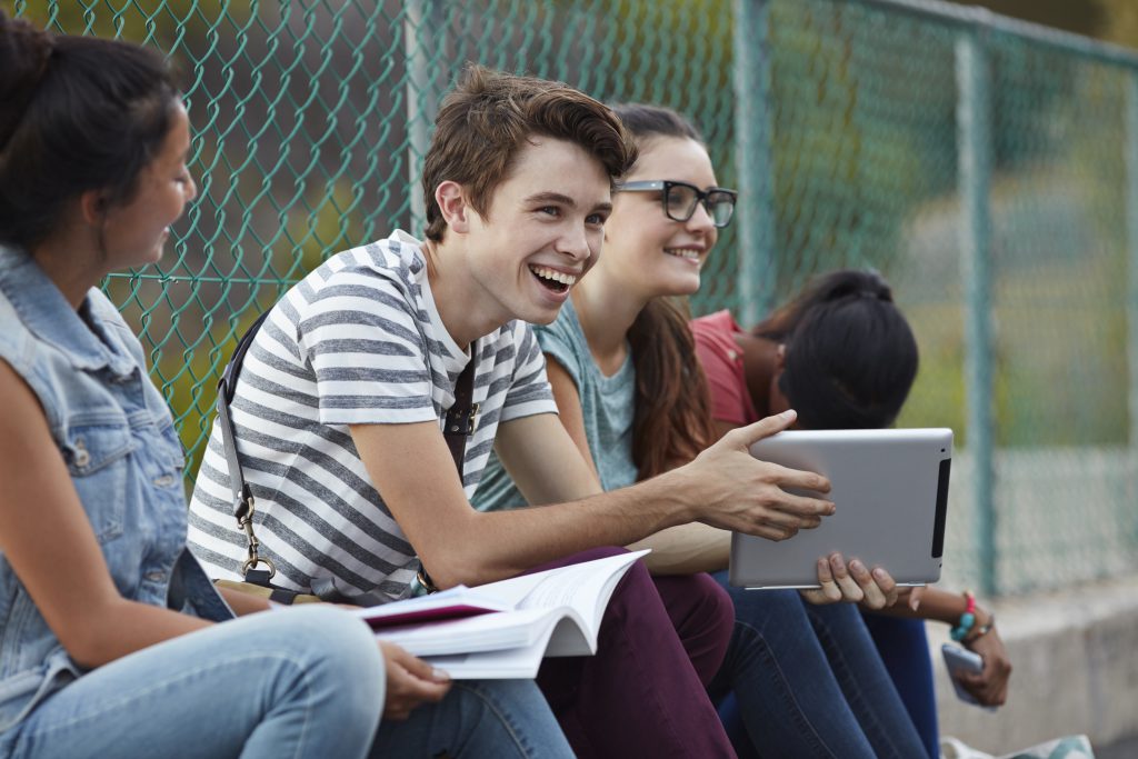 SnikingTeens sitting 